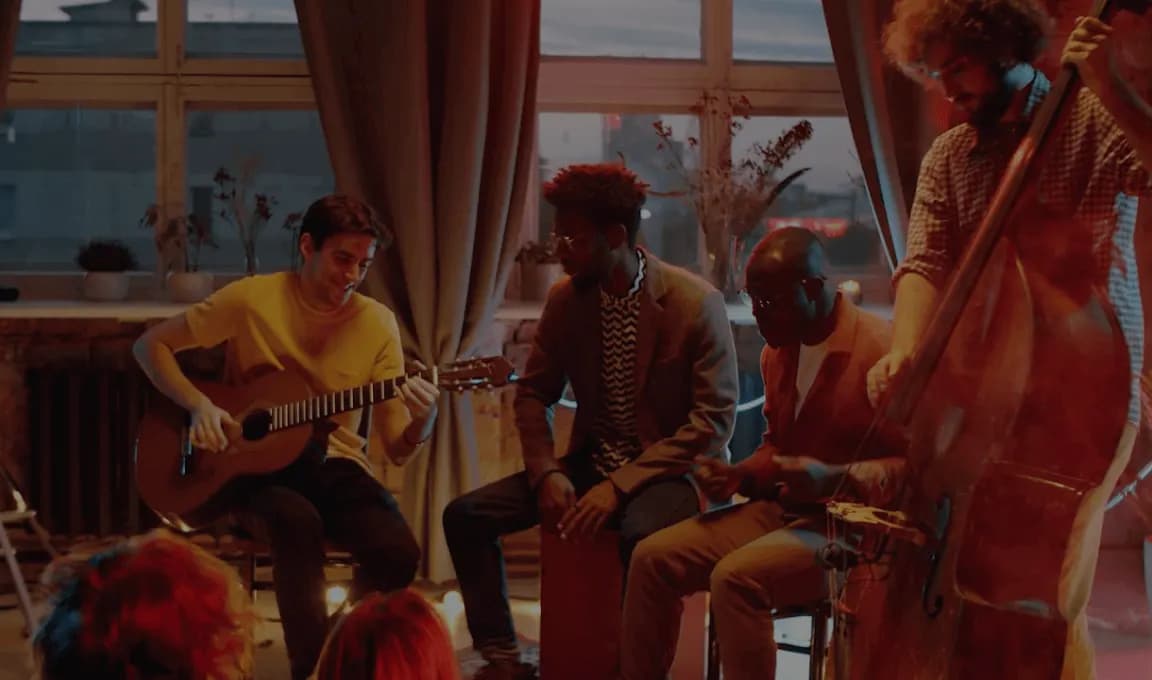 people in a band performing.