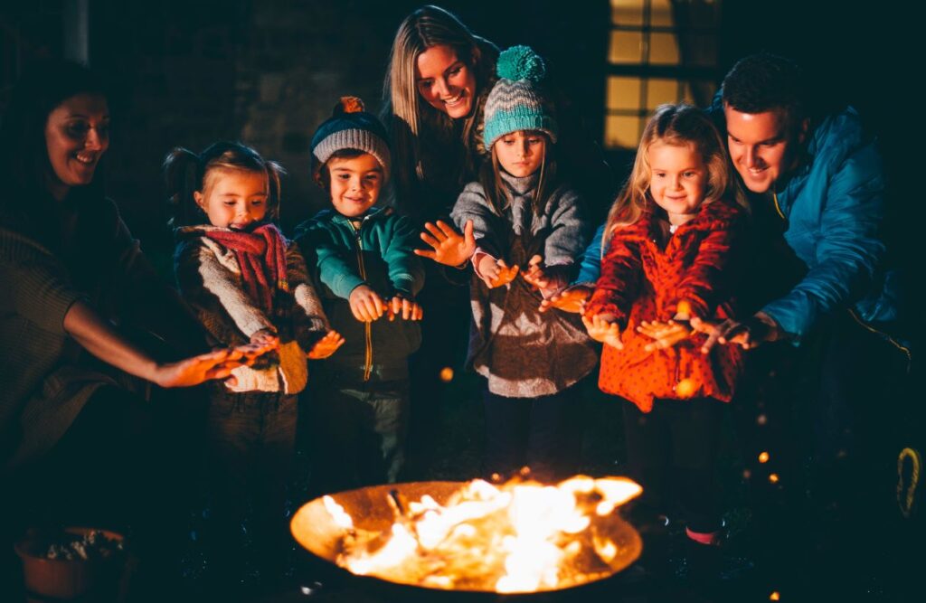10 Creative Family Reunion Activities to Make Your Gathering Memorable 9 Outdoor Movie Night or Bonfire with Storytelling