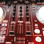 A DJ's mixing board, ready for an event