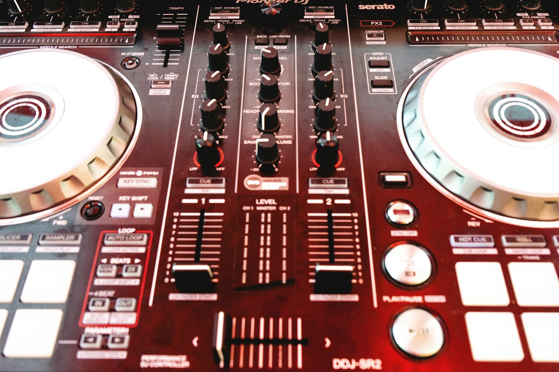 A DJ's mixing board, ready for an event