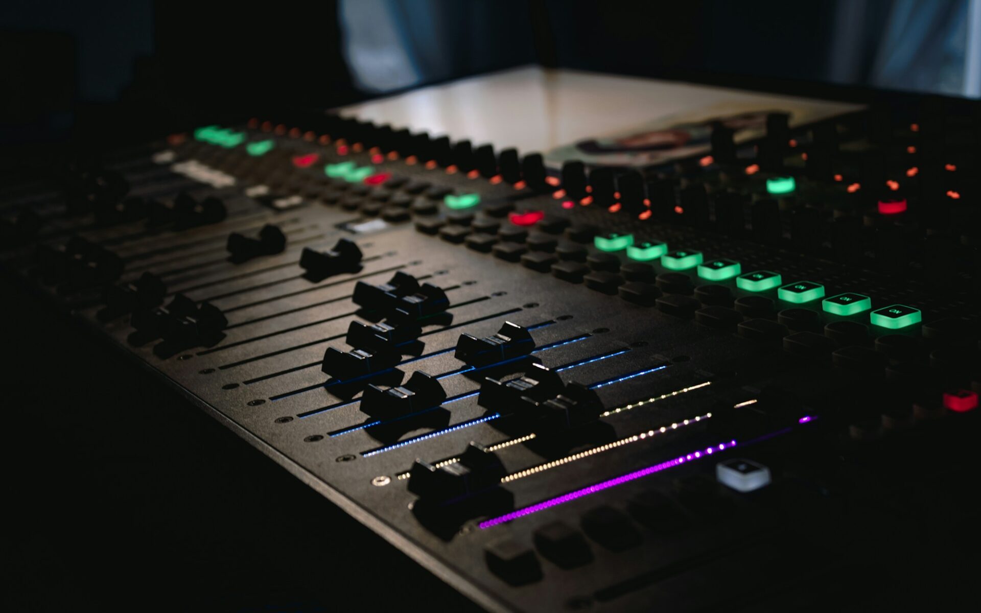 DJ mixing console with glowing controls, ready for an event