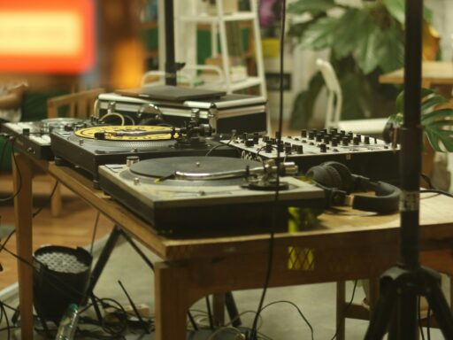 A DJ turntable and mixer setup on a table