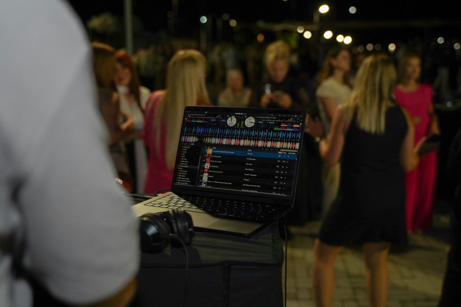 DJ mixing music at a wedding reception