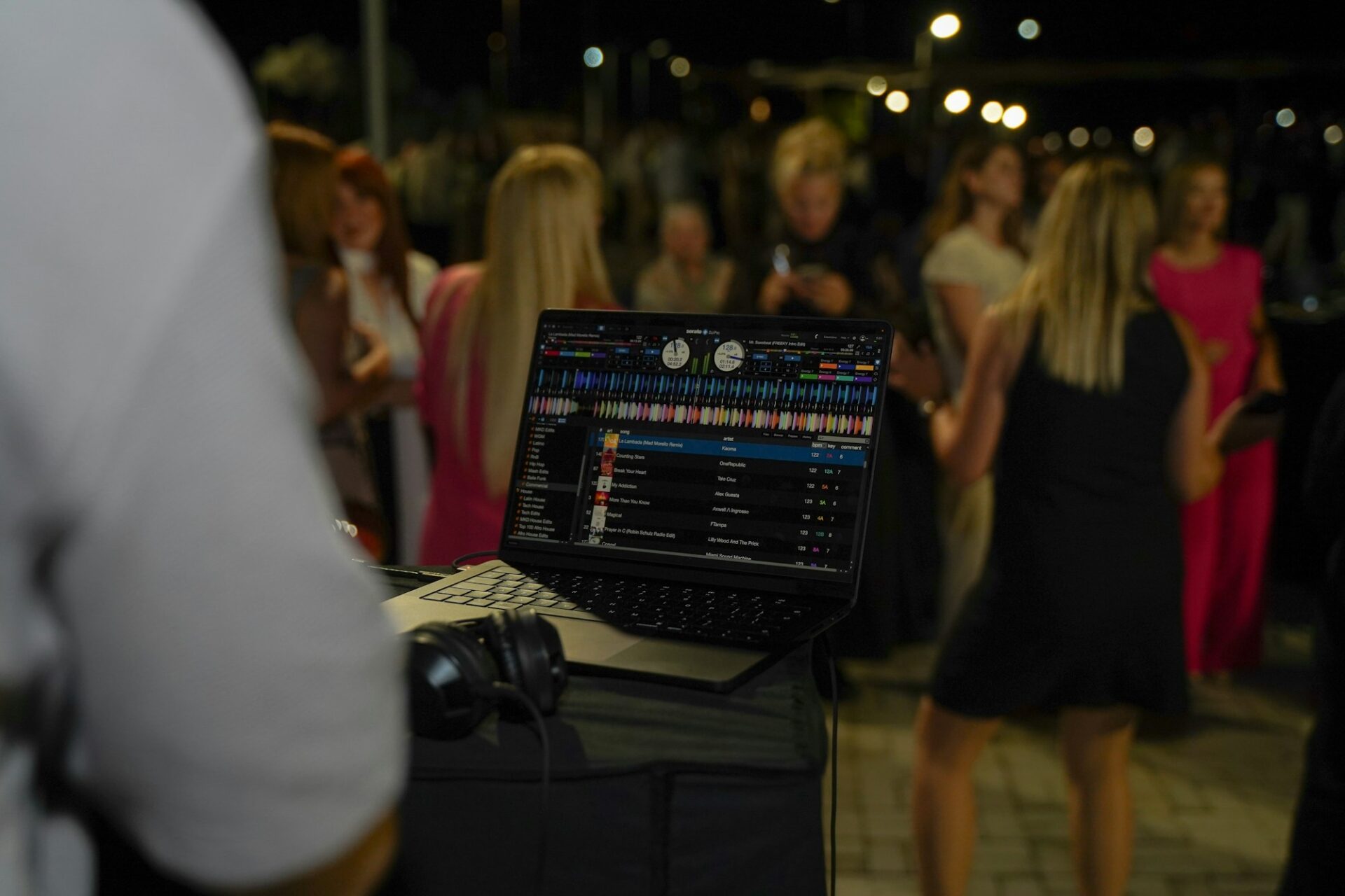 DJ mixing music at a wedding reception