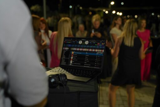 DJ mixing music at a wedding reception
