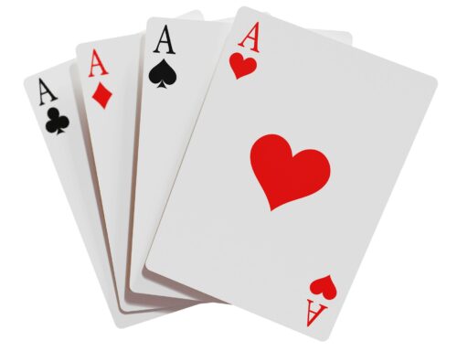 Four aces fanned out on a white background.