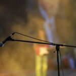 A microphone on stage, ready for a comedy set