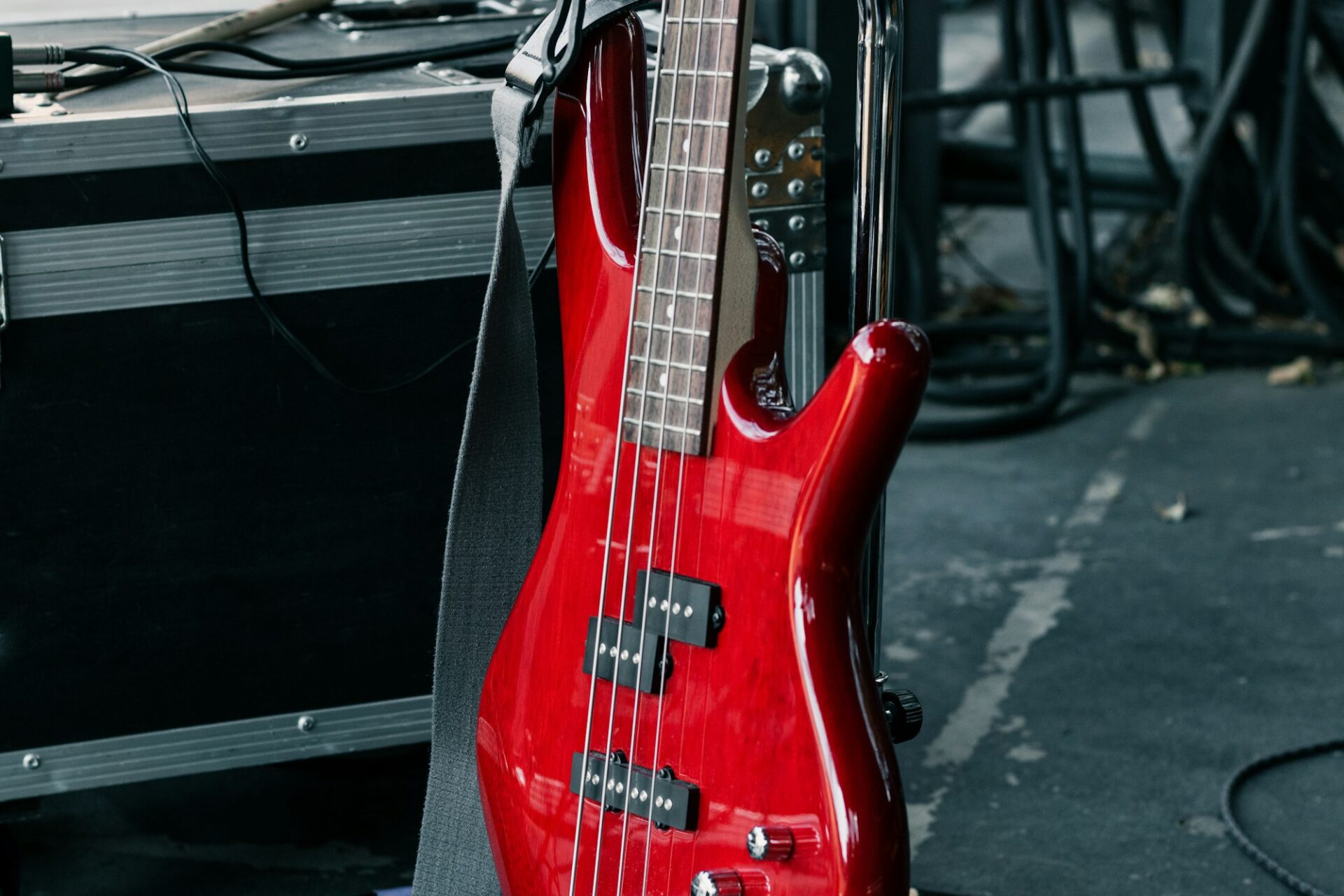 A red electric bass guitar