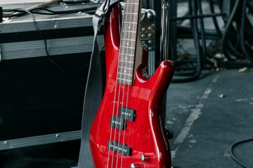 A red electric bass guitar