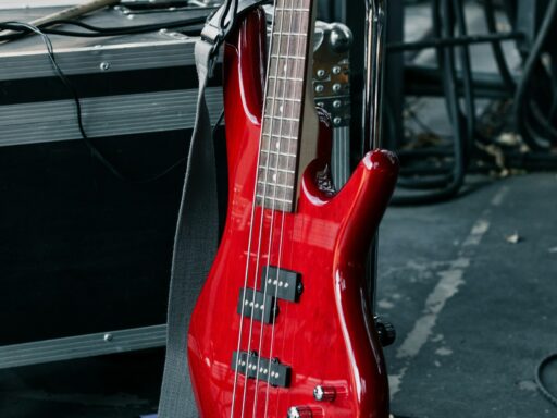 A red electric bass guitar