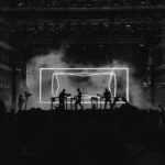 A live band performing on stage at an event