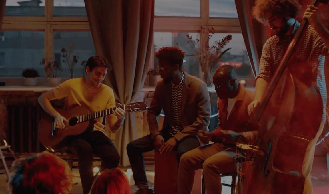 people in a band performing.